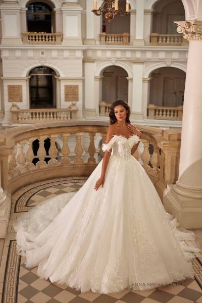 Robe de mariée princesse col bateau avec manchons à Marseille