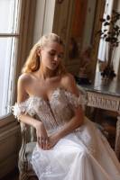 Robe de mariée bohème trapèze avec petits manchons à Marseille